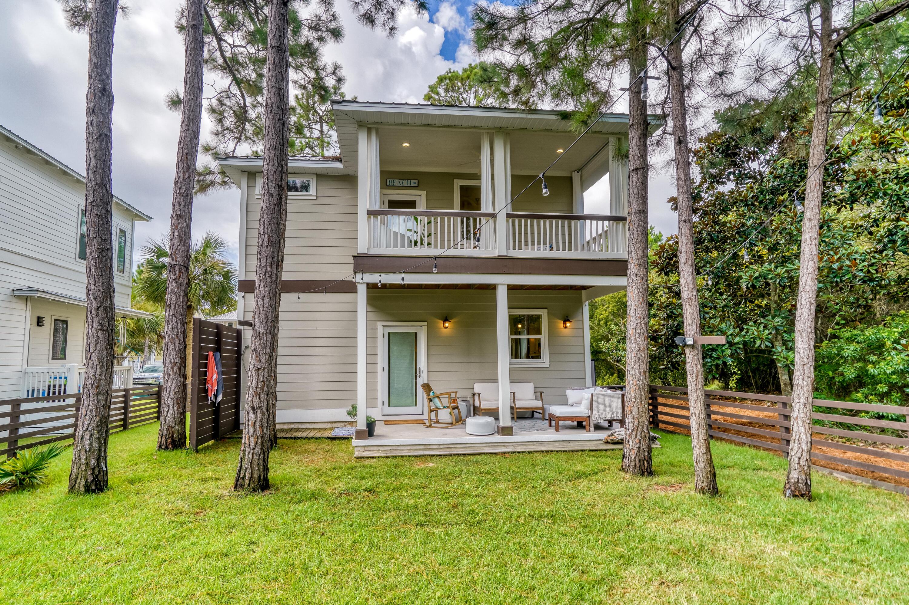 100 Snapper Street Santa Rosa Beach, FL 32459 - Photo 30 of 35 front view of a house with a yard