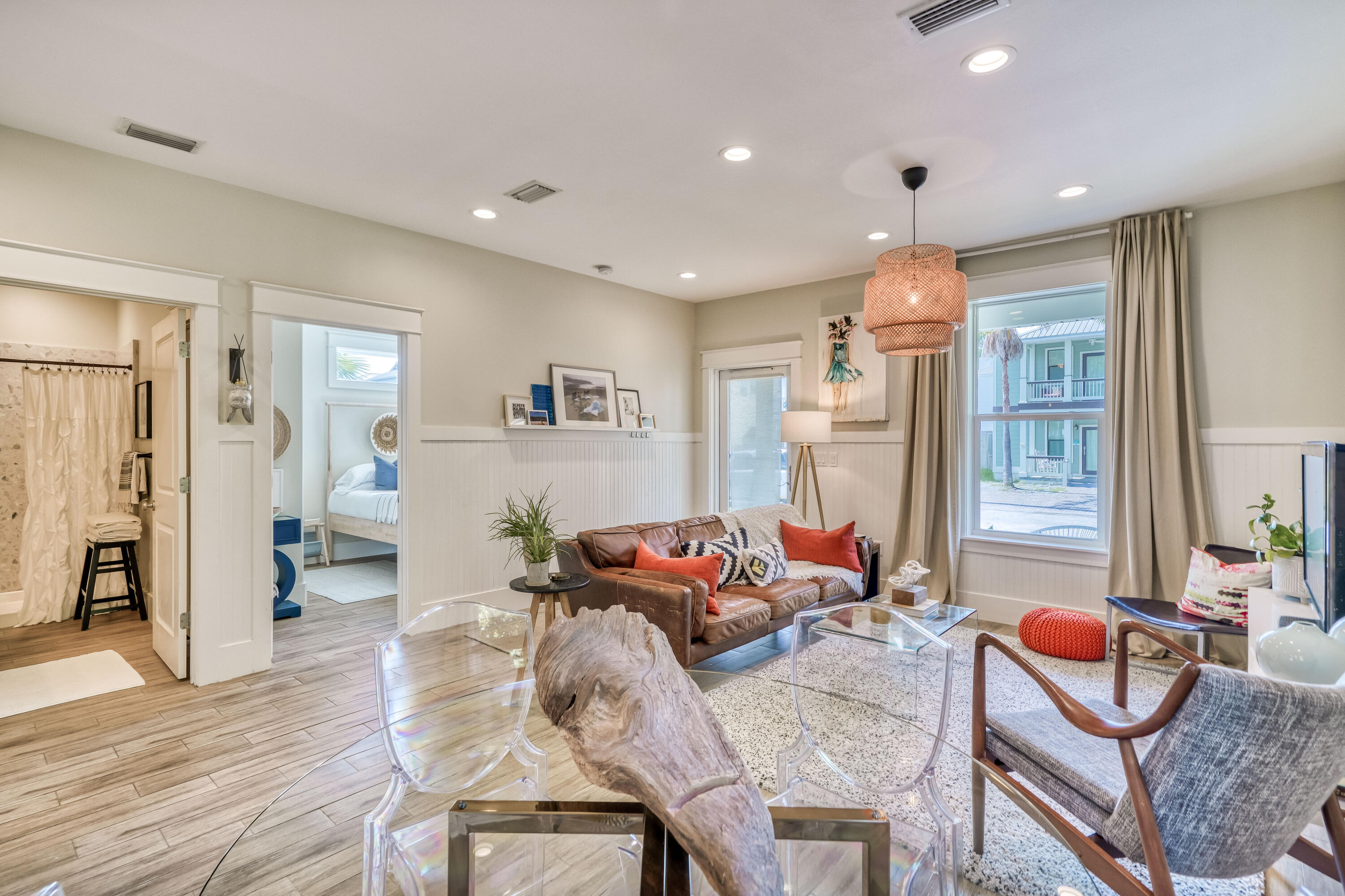 100 Snapper Street Santa Rosa Beach, FL 32459 - Photo 3 of 35 a living room with furniture and wooden floor