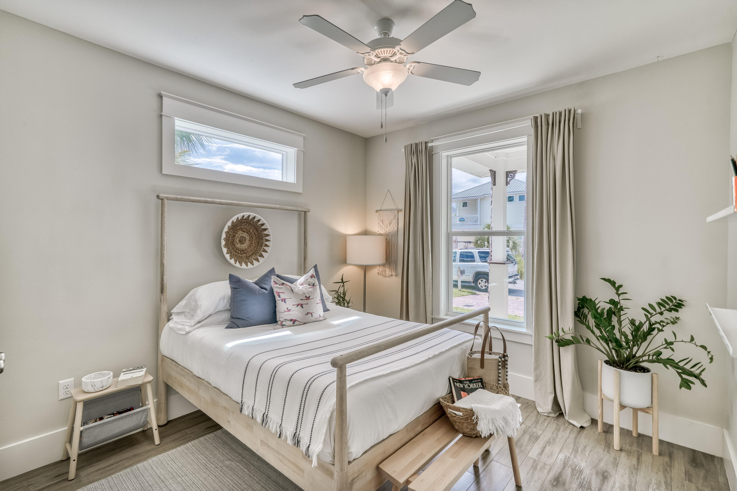 100 Snapper Street Santa Rosa Beach, FL 32459 - Photo 9 of 35 a bedroom with a bed and a potted plant