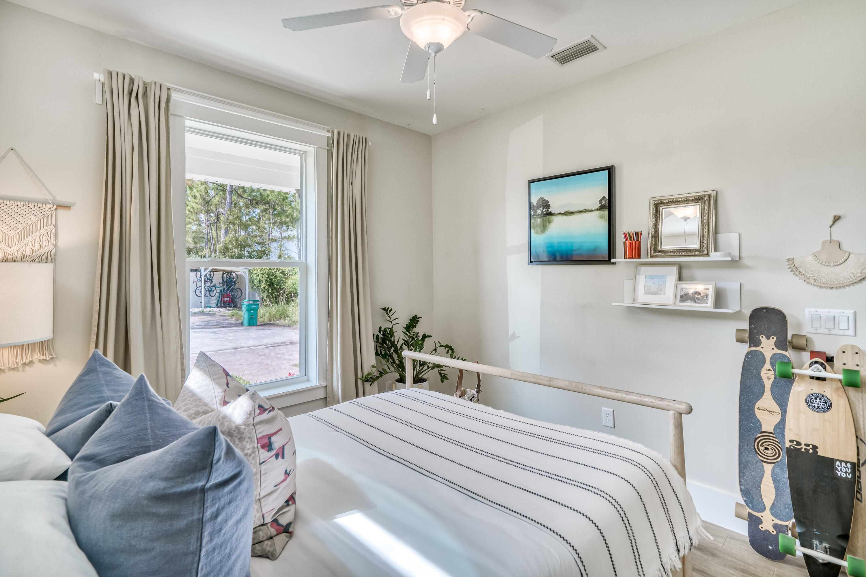 100 Snapper Street Santa Rosa Beach, FL 32459 - Photo 10 of 35 a bedroom with a bed and a chandelier