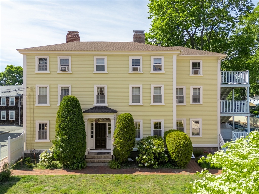 8 Williams Street, Unit E1 Salem, MA 01970 - Photo 1 of 30 a front view of a house with garden