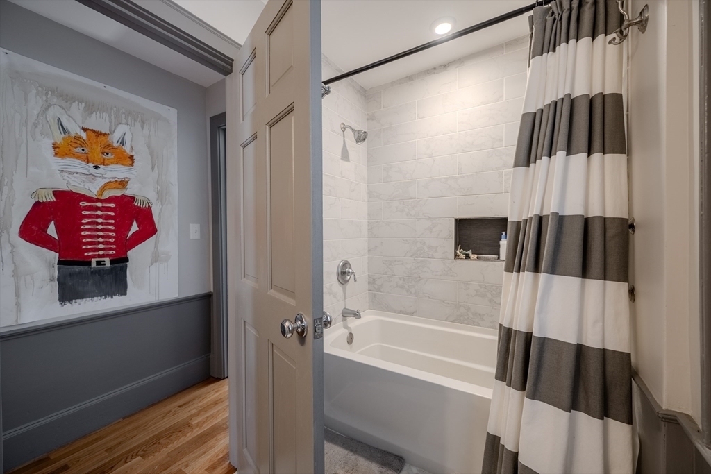 8 Williams Street, Unit E1 Salem, MA 01970 - Photo 19 of 30 a bathroom with a bathtub and a shower