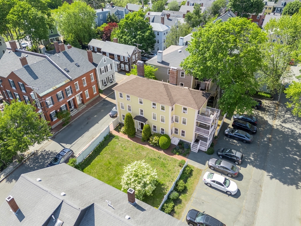 8 Williams Street, Unit E1 Salem, MA 01970 - Photo 23 of 30 an aerial view of multiple houses with yard