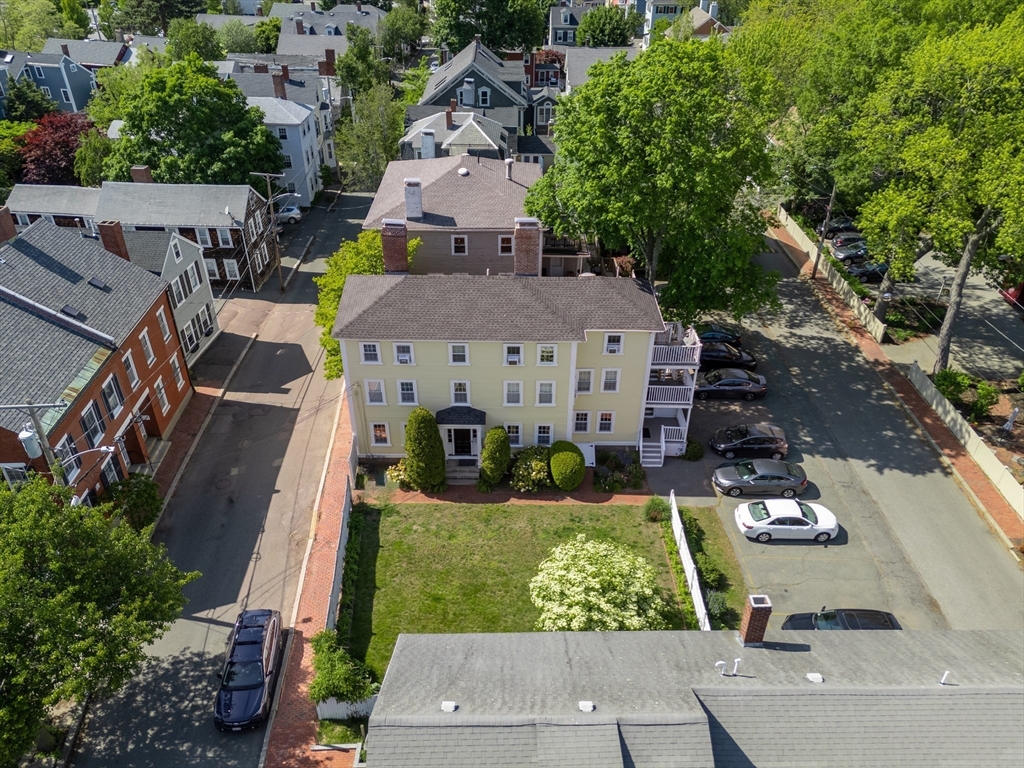 8 Williams Street, Unit E1 Salem, MA 01970 - Photo 28 of 30 an aerial view of a house with garden space ocean view