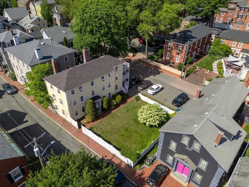 8 Williams Street, Unit E1 Salem, MA 01970 - Photo 29 of 30 an aerial view of multiple houses with yard