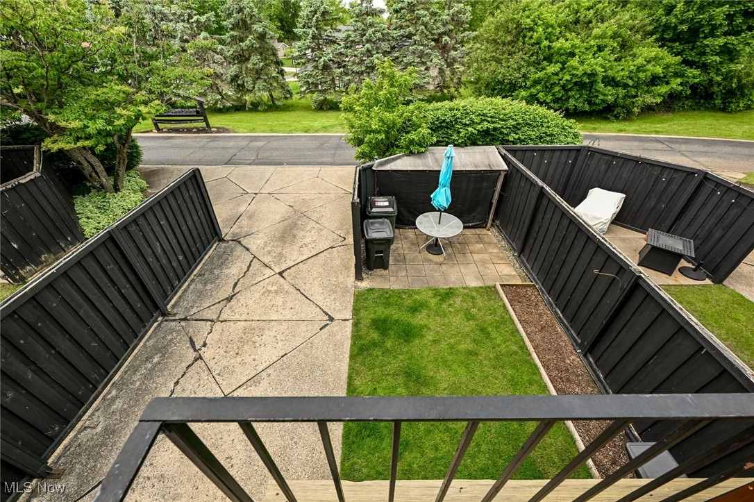 824 South Chillicothe Road, Unit 6 Aurora, OH 44202 - Photo 24 of 35 View from second floor overlooking the patio, garden and driveway.