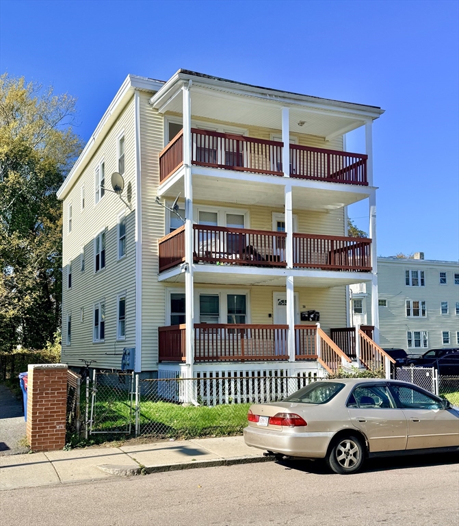 39 Wentworth Street, Unit 3 Boston, MA 02124 - Photo 19 of 19 a car parked in front of a building