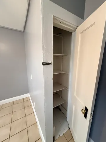 a kitchen with a stove a sink and a refrigerator