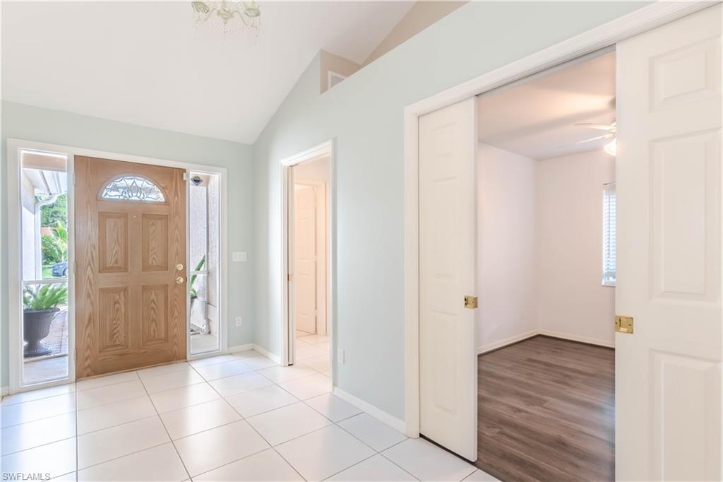 11153 San Sebastian Lane Bonita Springs, FL 34135 - Photo 17 of 25 a view of a hallway with wooden floor