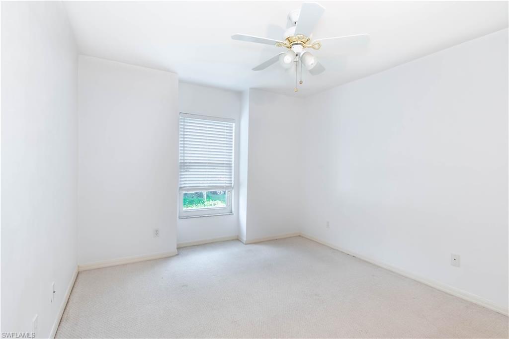 11153 San Sebastian Lane Bonita Springs, FL 34135 - Photo 18 of 25 an empty room with a window