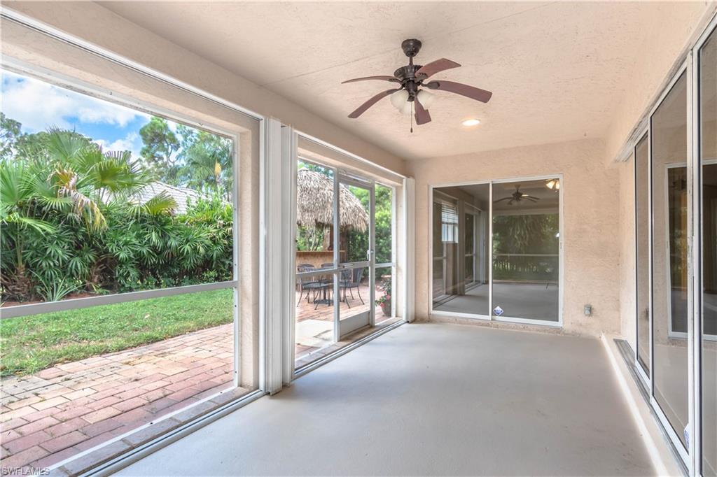 11153 San Sebastian Lane Bonita Springs, FL 34135 - Photo 24 of 25 a view of a porch with wooden floor and outer view