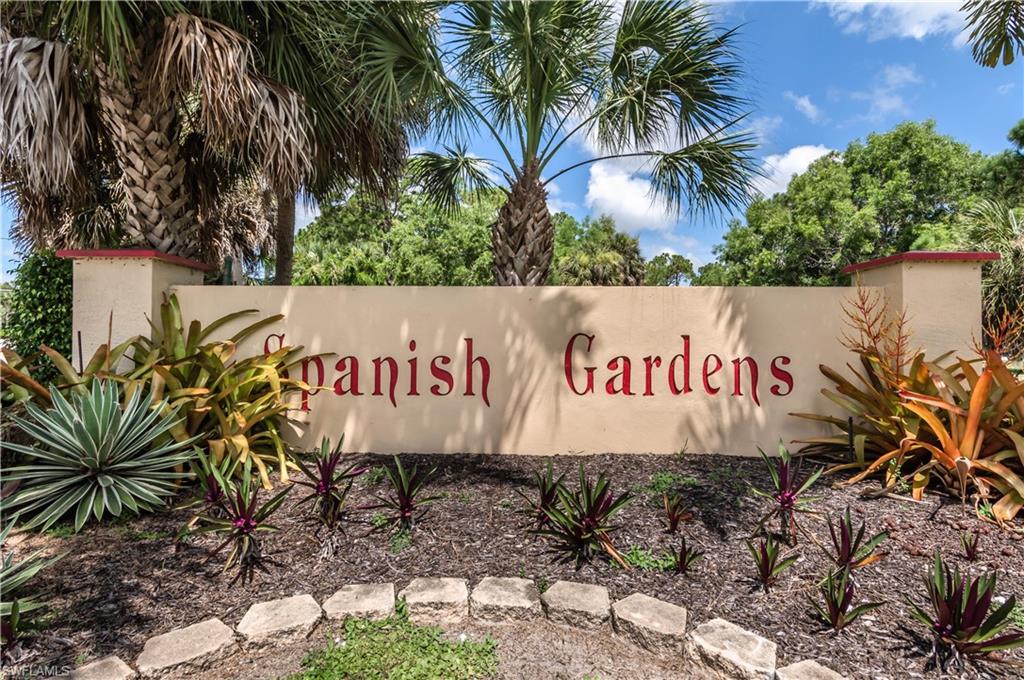 11153 San Sebastian Lane Bonita Springs, FL 34135 - Photo 25 of 25 a sign that is on a wall with a palm tree