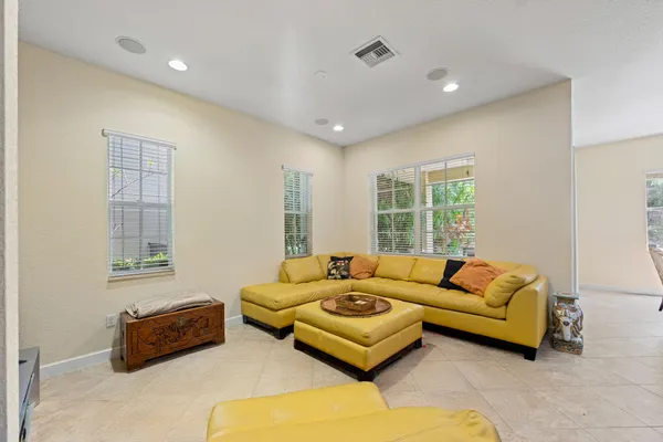 a kitchen with stainless steel appliances granite countertop a sink stove and microwave