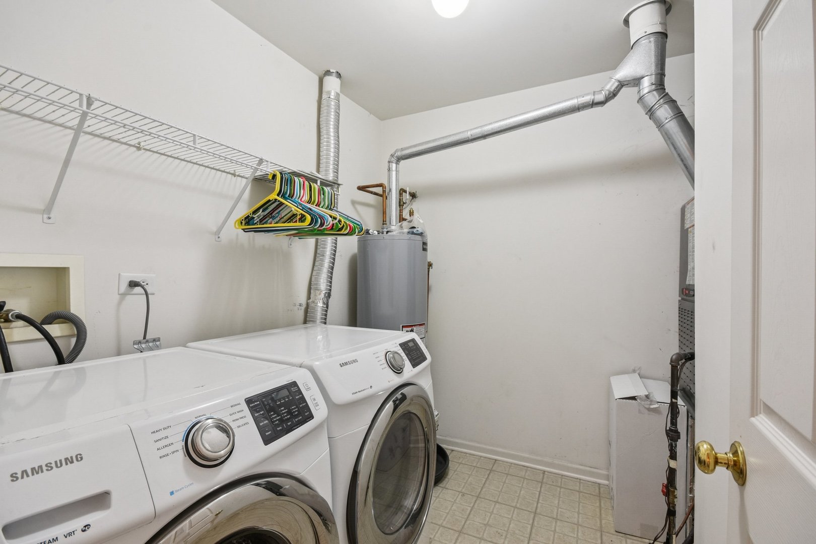 2486 Georgetown Circle Aurora, IL 60503 - Photo 19 of 26 a utility room with dryer and washer