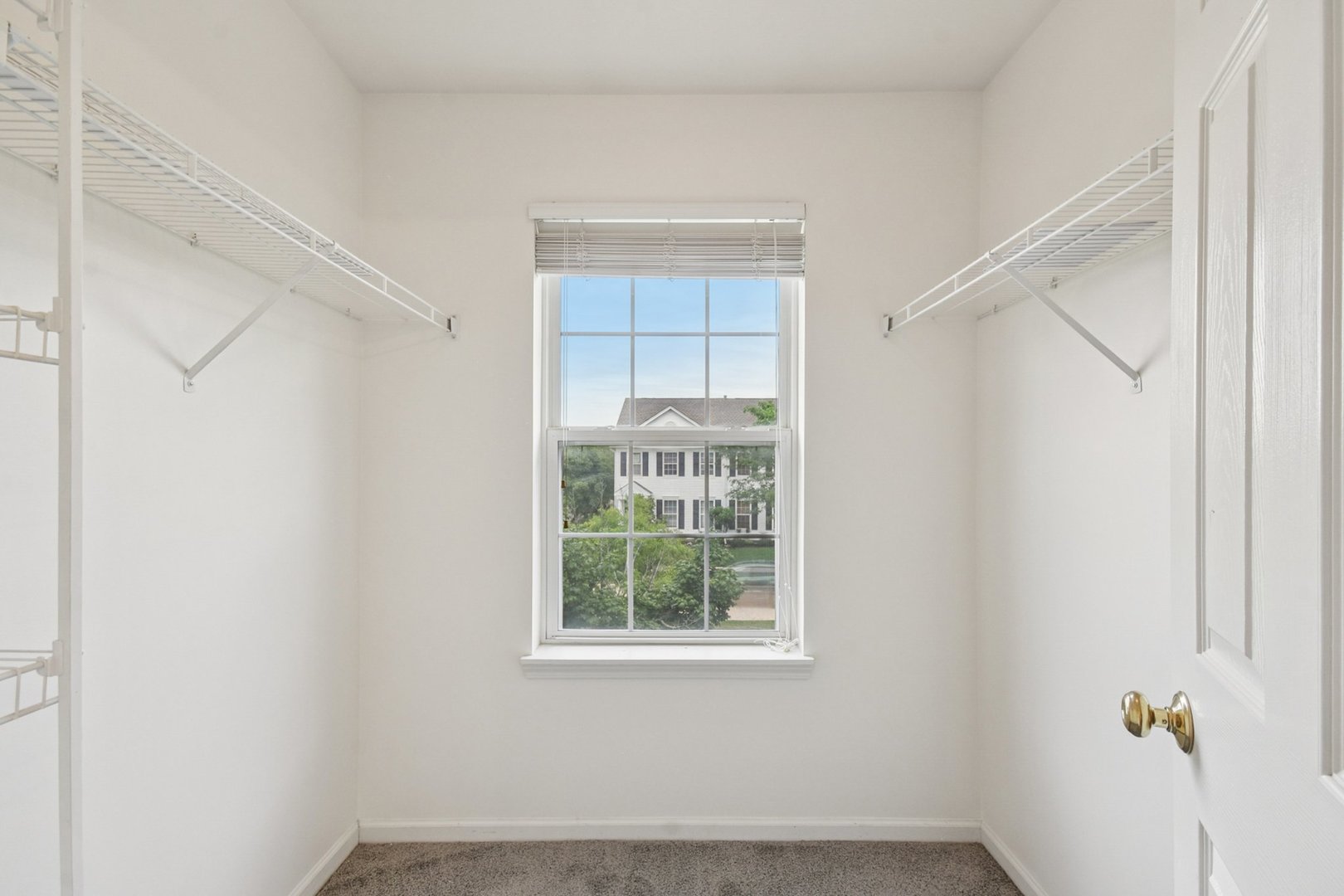 2486 Georgetown Circle Aurora, IL 60503 - Photo 22 of 26 a view of a room that has a window in it