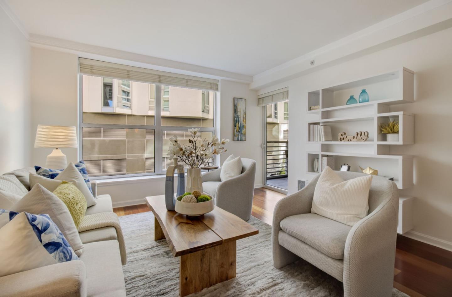 a living room with furniture and a window