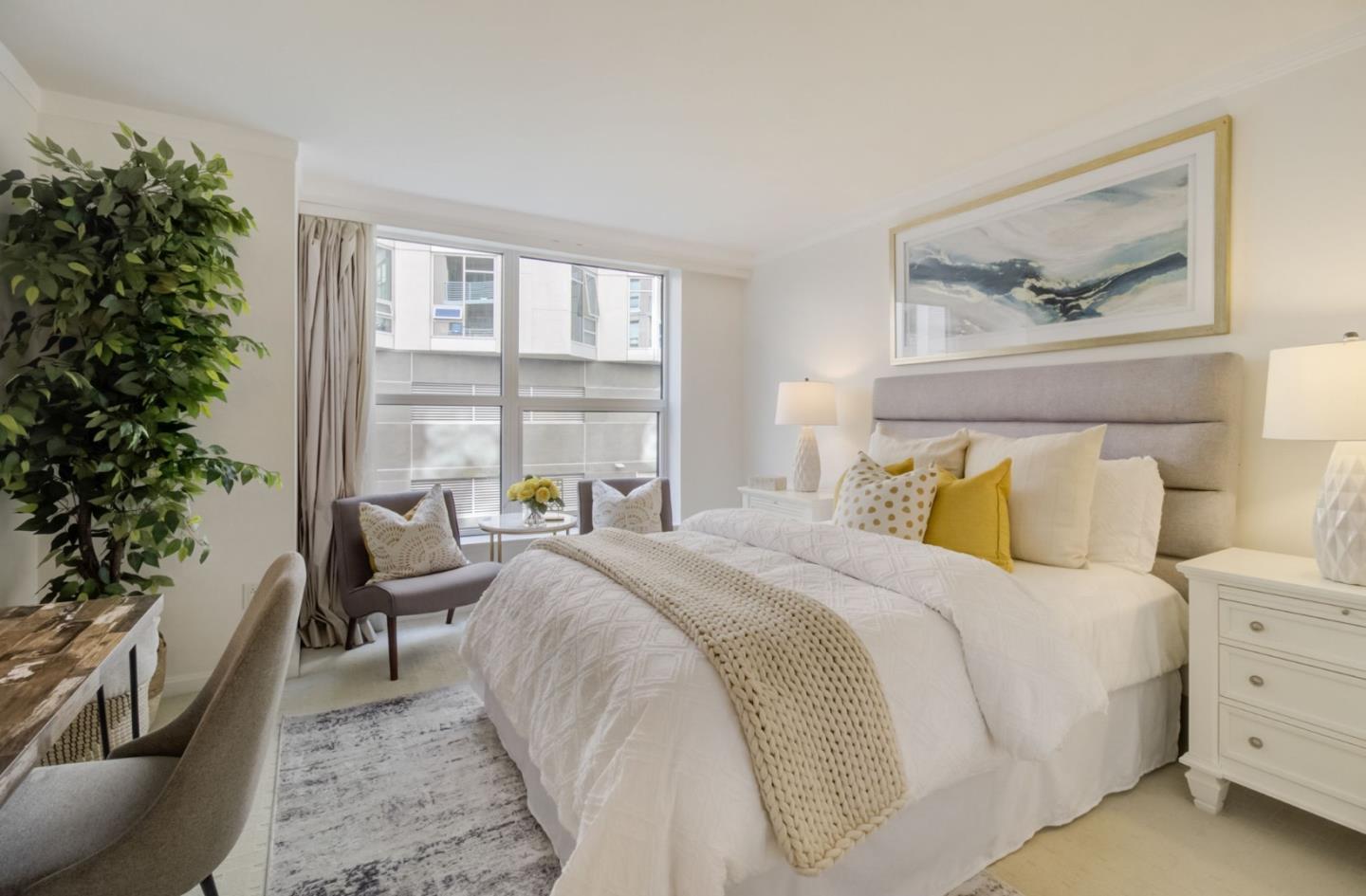 400 Beale Street, Unit 612 San Francisco, CA 94105 - Photo 21 of 38 a bedroom with a bed and a couch
