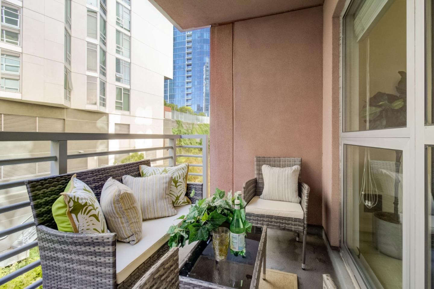 400 Beale Street, Unit 612 San Francisco, CA 94105 - Photo 25 of 38 a front view of a house with outdoor seating