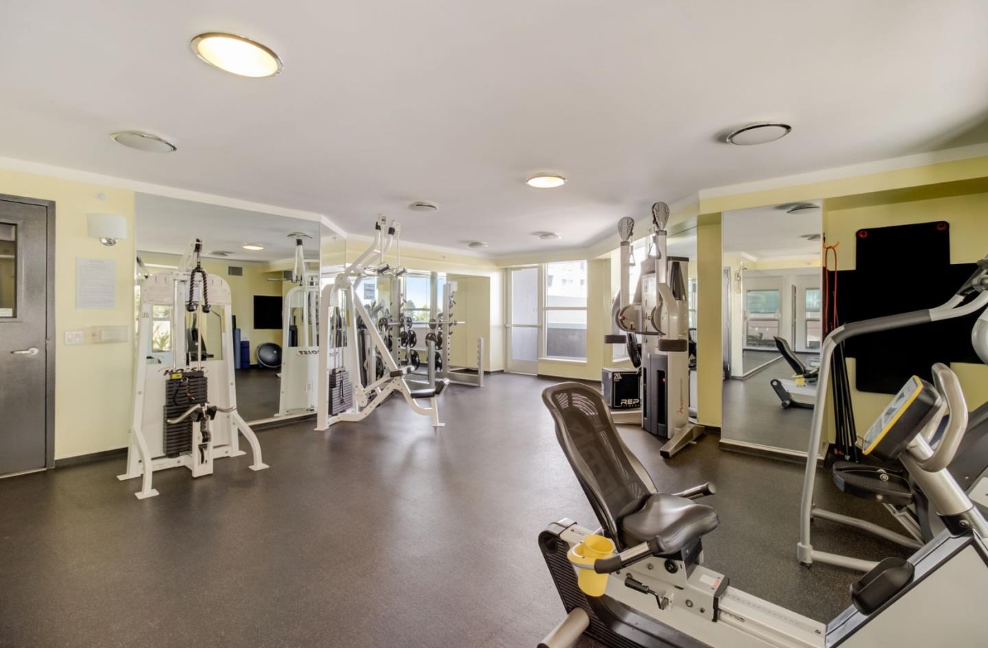 400 Beale Street, Unit 612 San Francisco, CA 94105 - Photo 32 of 38 a view of a room with gym equipment