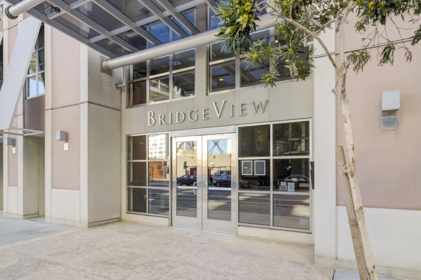 400 Beale Street, Unit 612 San Francisco, CA 94105 - Photo 35 of 38 a view of a building with a glass door