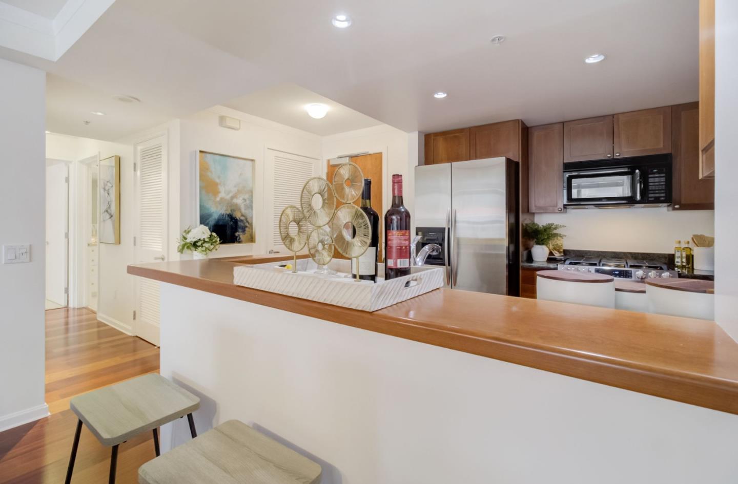 400 Beale Street, Unit 612 San Francisco, CA 94105 - Photo 8 of 38 a view of a living room kitchen and a sink