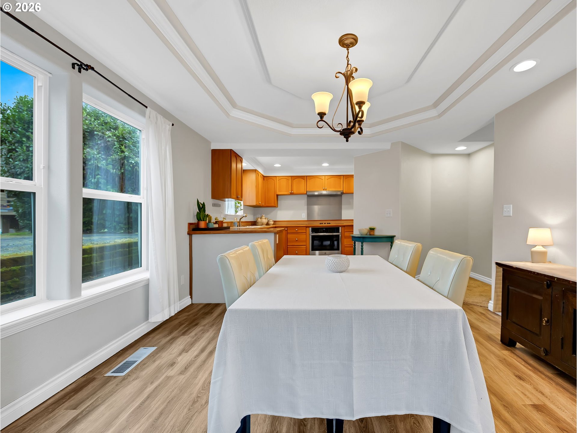 1312 Jackson Street Oregon City, OR 97045 - Photo 15 of 48 a view of kitchen with sink microwave refrigerator and dining table