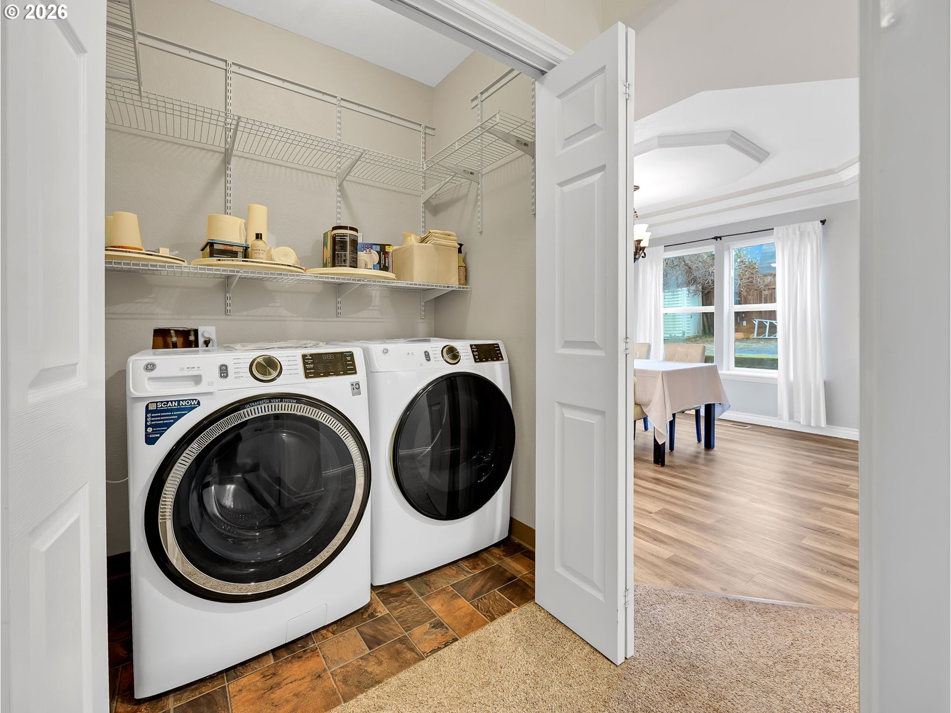 1312 Jackson Street Oregon City, OR 97045 - Photo 16 of 48 a view of a hallway with washer and dryer