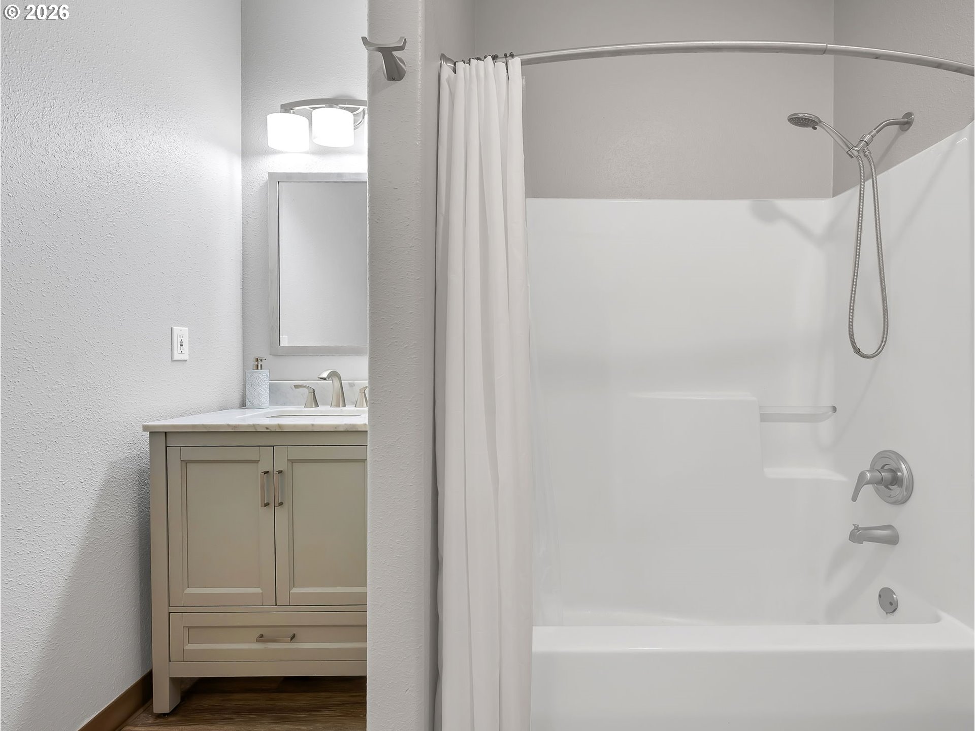 1312 Jackson Street Oregon City, OR 97045 - Photo 19 of 48 a bathroom with a shower and a sink