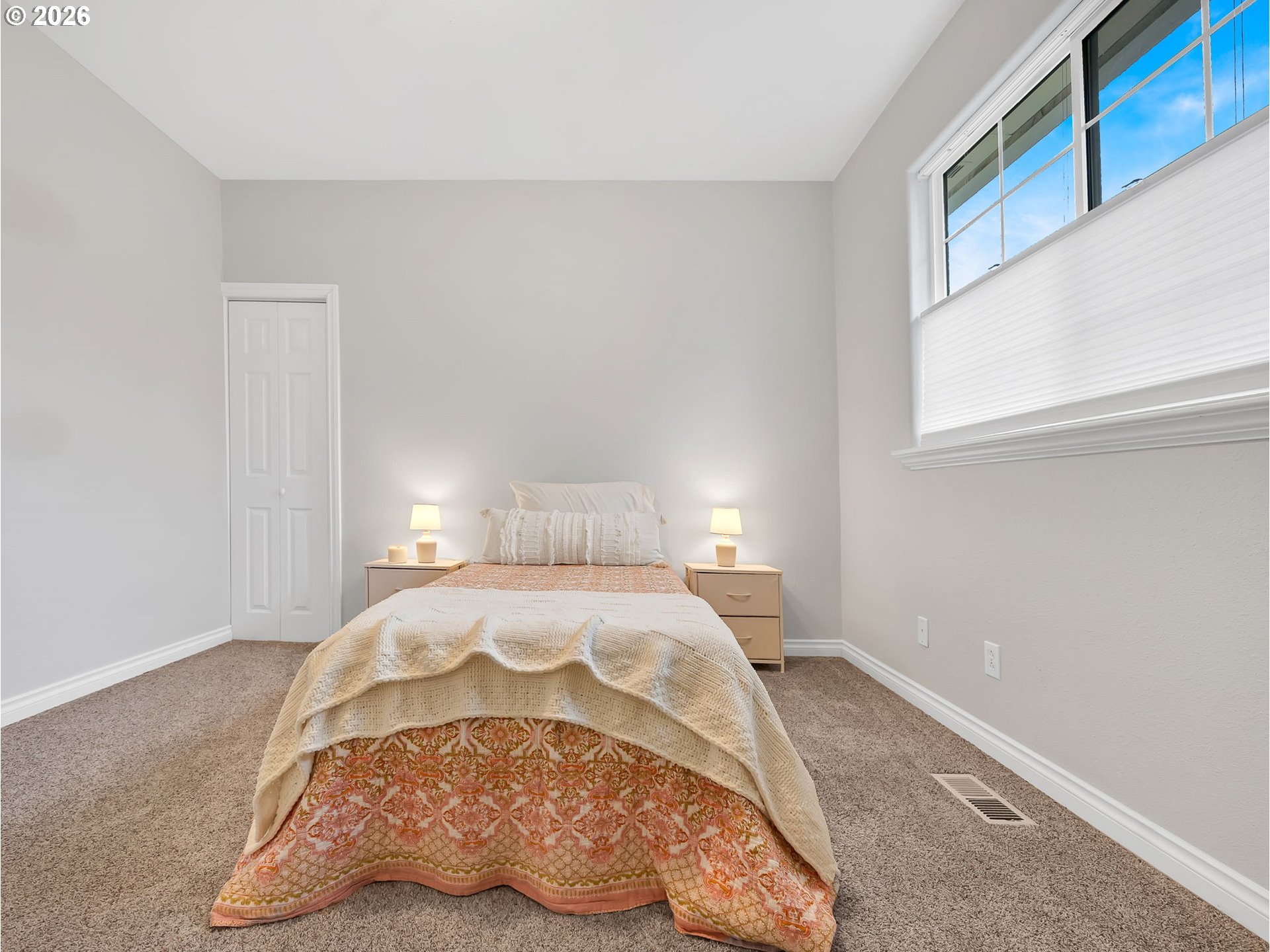1312 Jackson Street Oregon City, OR 97045 - Photo 23 of 48 a bedroom with a bed and a window