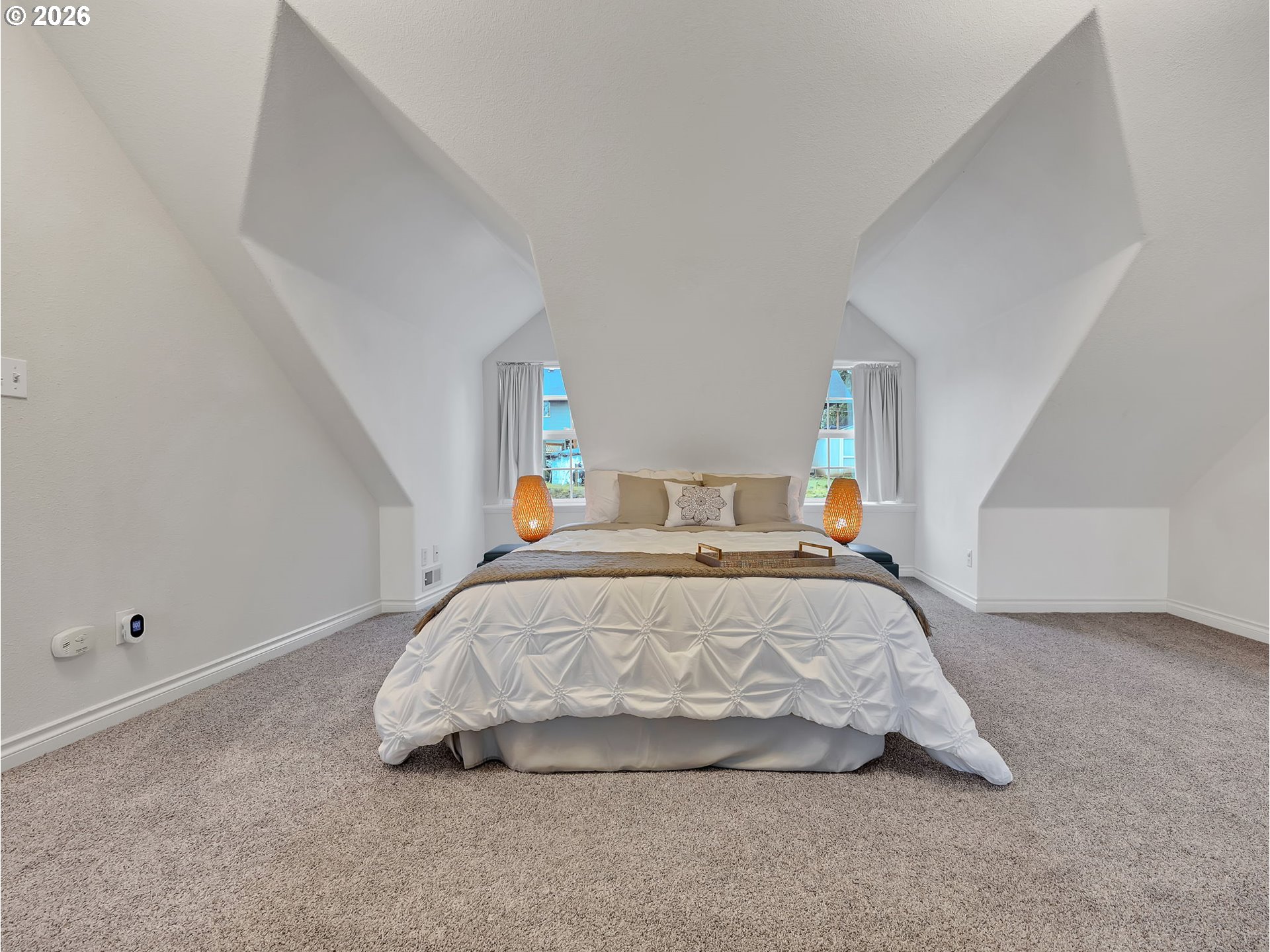 1312 Jackson Street Oregon City, OR 97045 - Photo 30 of 48 a bed sitting in a bedroom next to a window