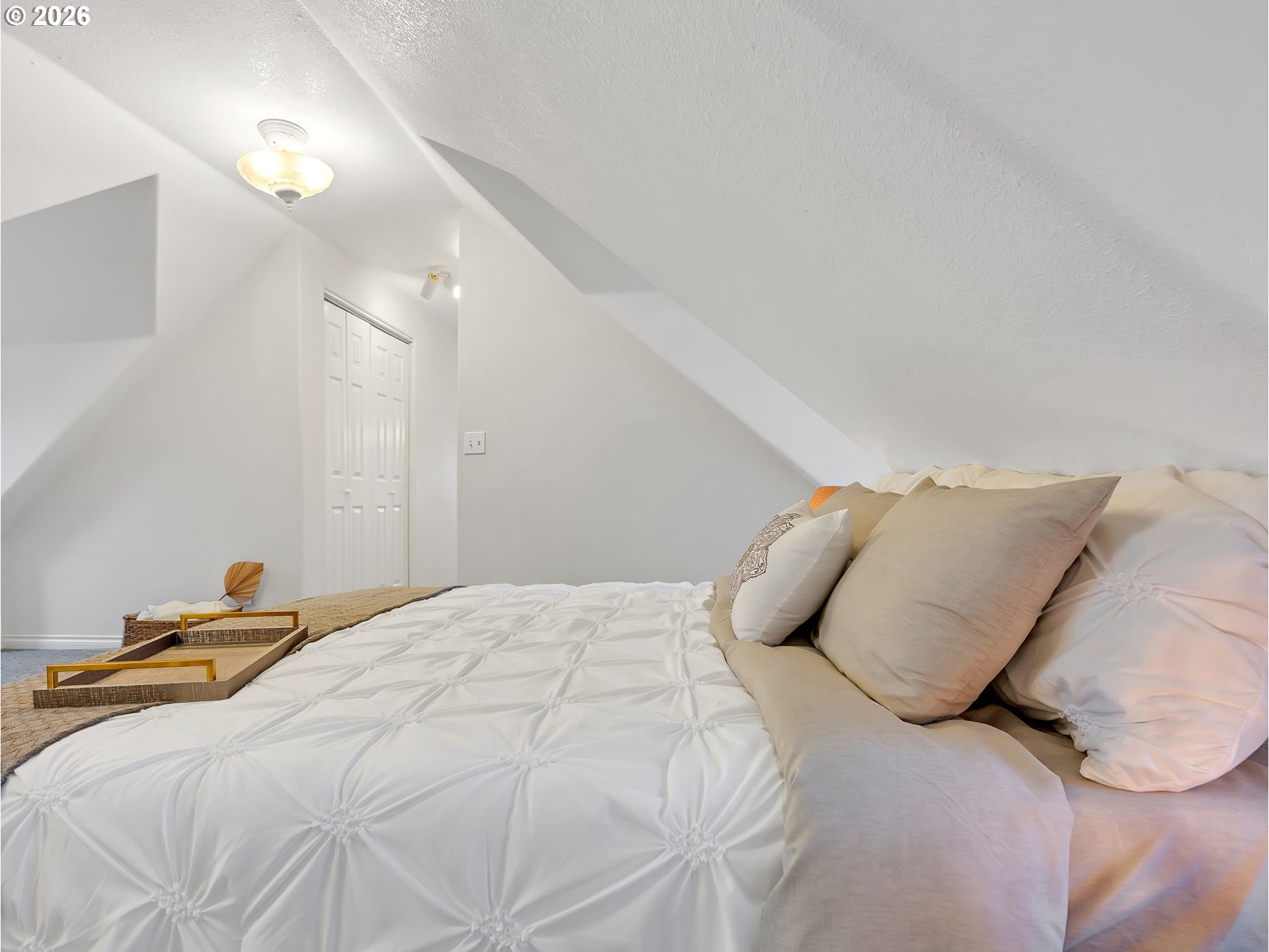 1312 Jackson Street Oregon City, OR 97045 - Photo 31 of 48 a bedroom with a bed and a lamp with the dresser