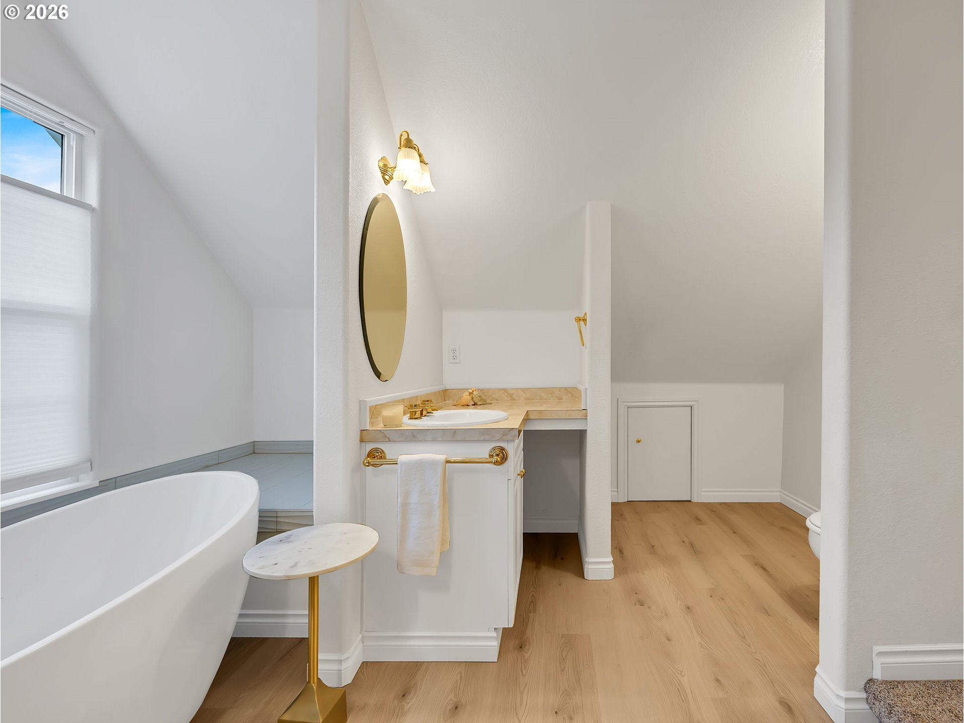 1312 Jackson Street Oregon City, OR 97045 - Photo 40 of 48 a bathroom with a sink a mirror and a bathtub