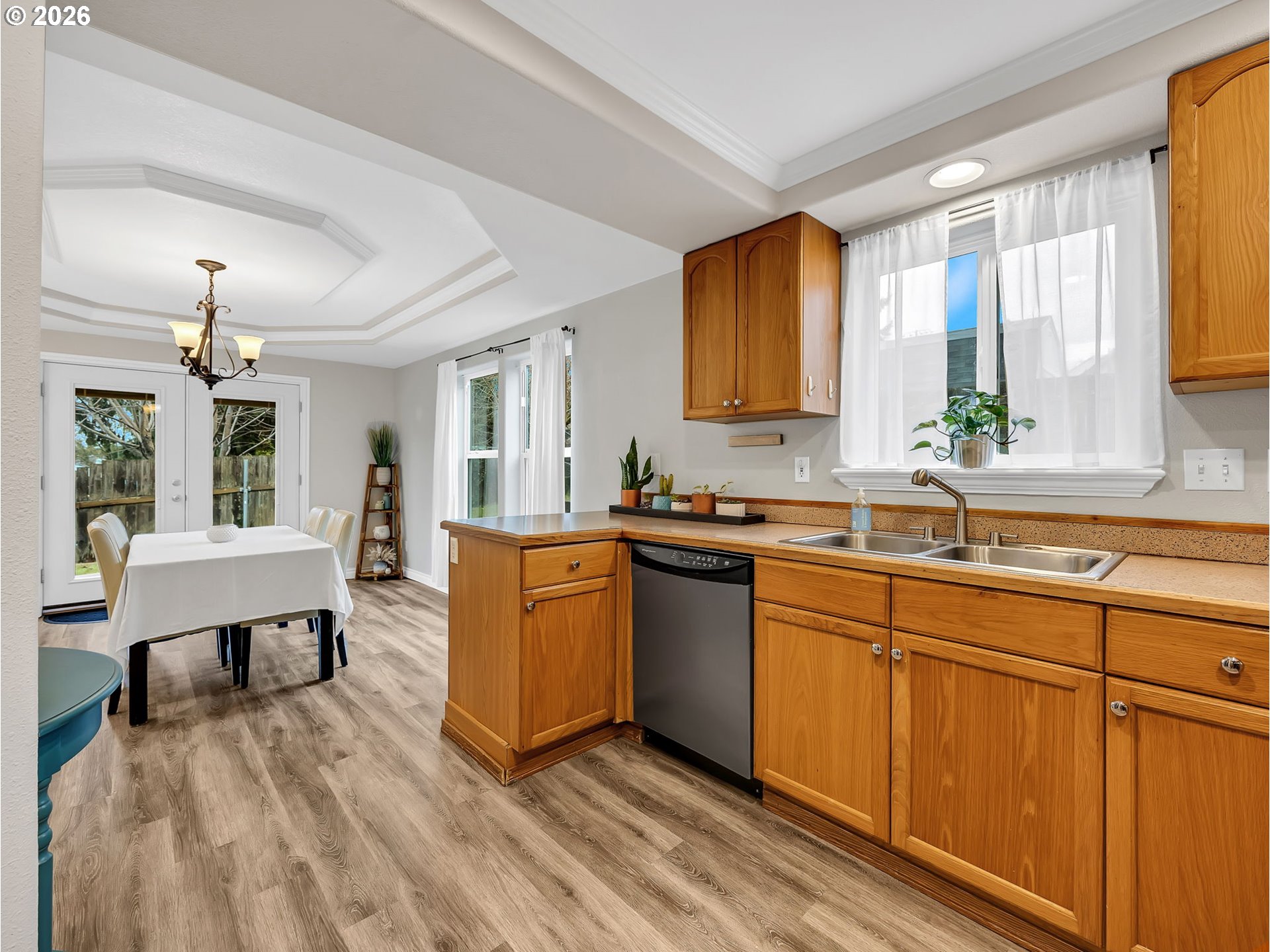 1312 Jackson Street Oregon City, OR 97045 - Photo 10 of 48 a kitchen with stainless steel appliances granite countertop sink stove and refrigerator