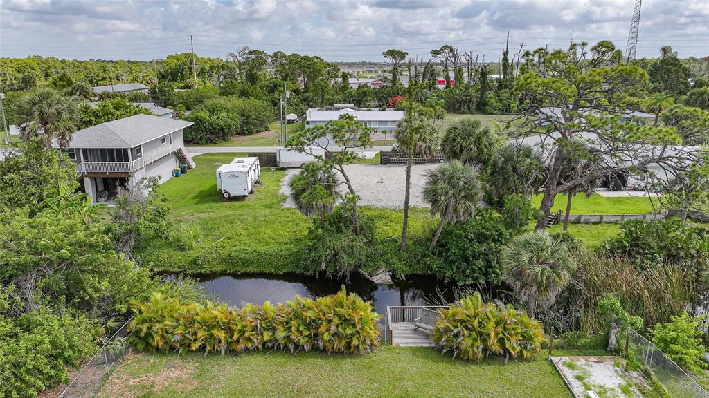 8164 Archie Street Englewood, FL 34224 - Photo 36 of 42 an aerial view of a house with a yard basket ball court and outdoor seating