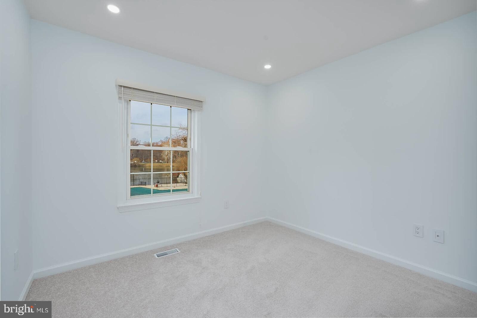 10246 Arizona Circle, Unit 36 Bethesda, MD 20817 - Photo 16 of 30 an empty room with a window