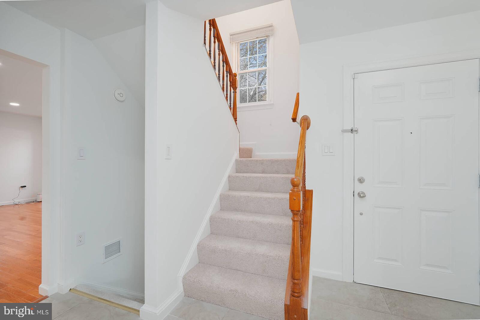 10246 Arizona Circle, Unit 36 Bethesda, MD 20817 - Photo 3 of 30 a view of staircase with white walls