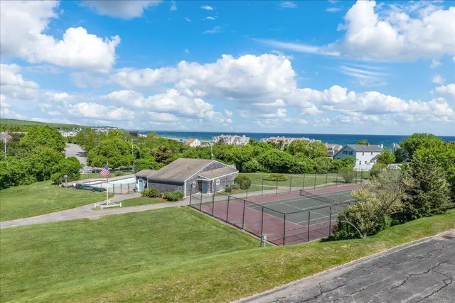 a bathroom with a bathtub and a sink