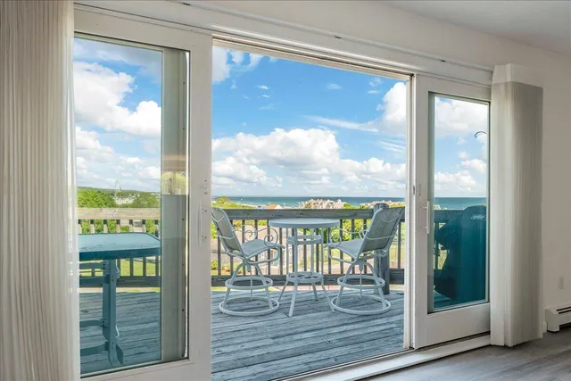a view of a chairs and table in the patio