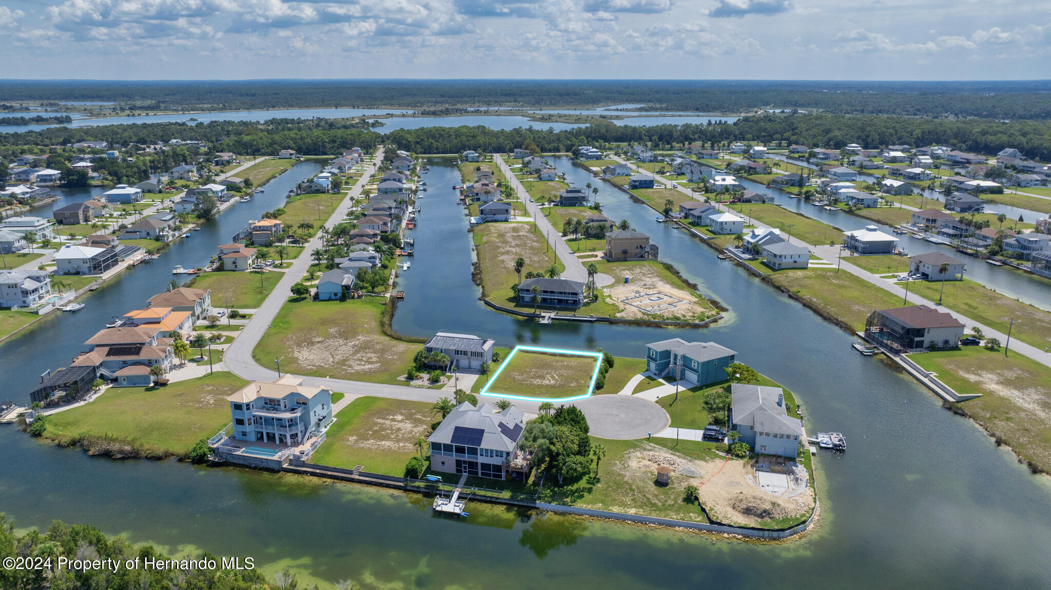 3358 Bluefish Drive Brooksville, FL 34607 - Photo 10 of 13 an aerial view of residential houses with outdoor space