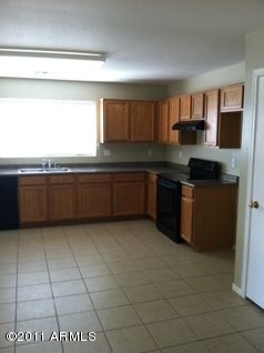 9909 West Heber Road Tolleson, AZ 85353 - Photo 4 of 15 kitchen 1