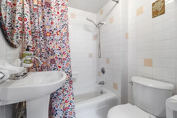 a view of a balcony with furniture