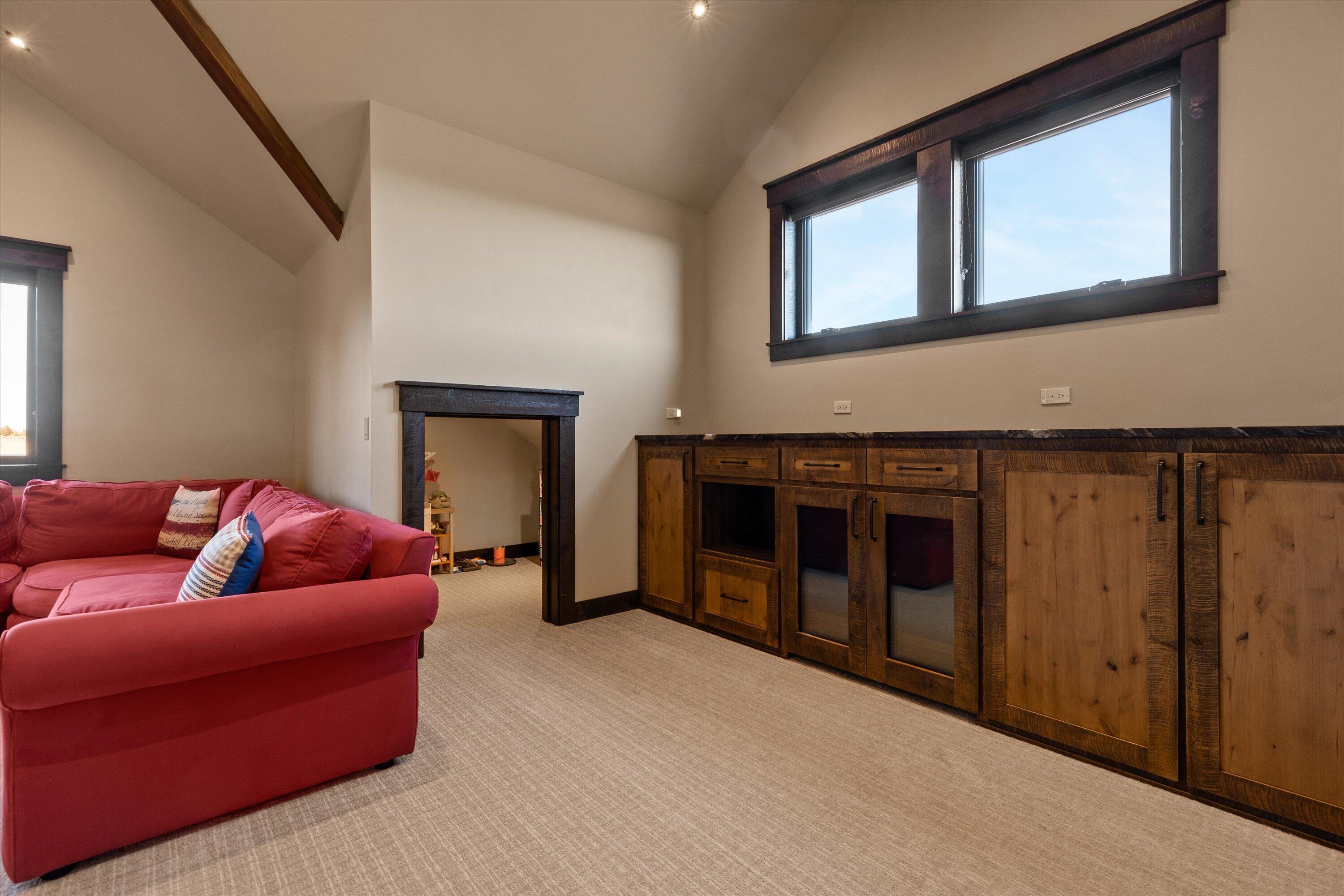 15626 South W Brasada Ranch Road Powell Butte, OR 97753 - Photo 61 of 81 a living room with furniture and a fireplace