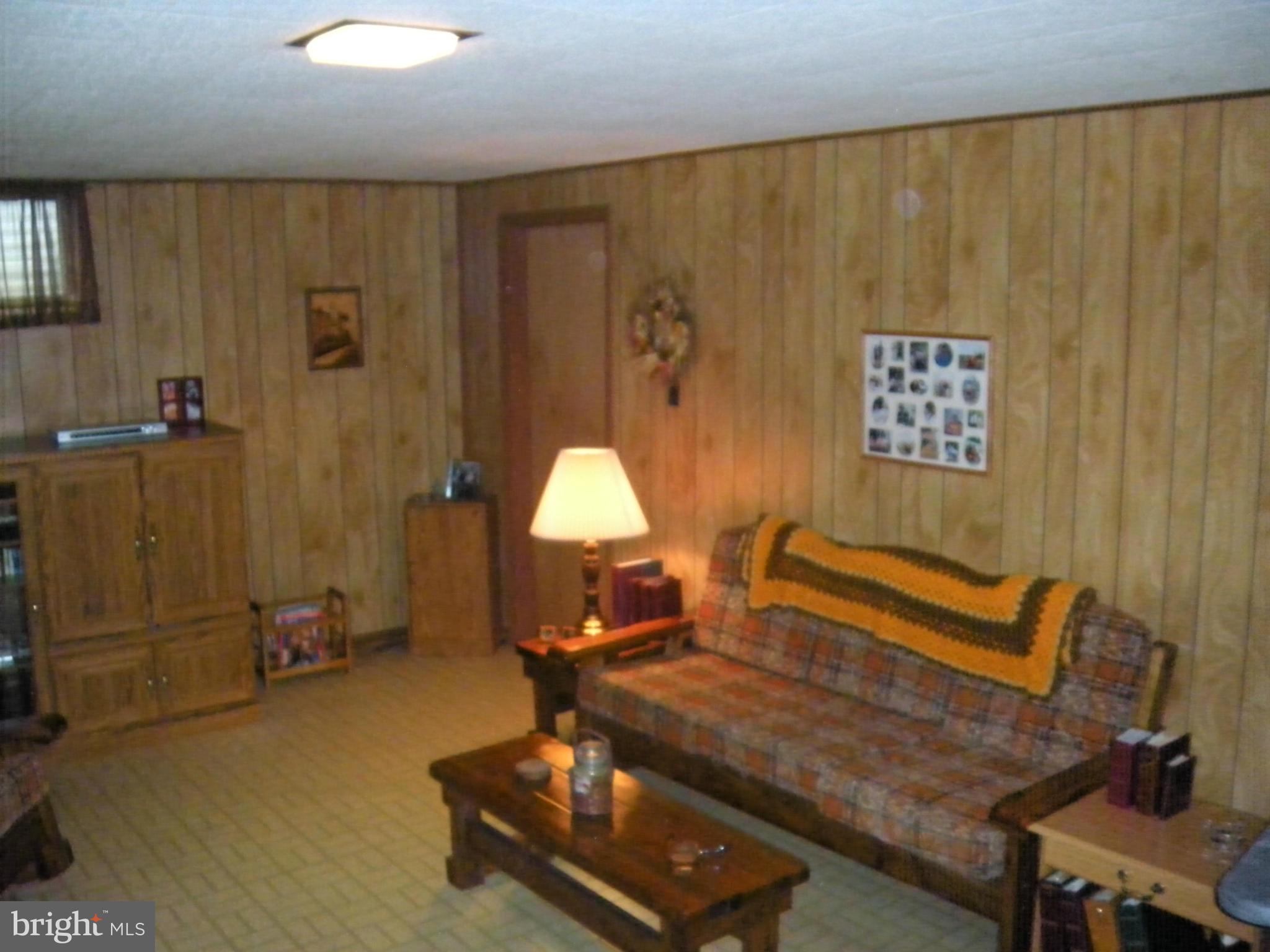 1307 Taney Avenue Frederick, MD 21702 - Photo 18 of 23 a room with a table and a chair