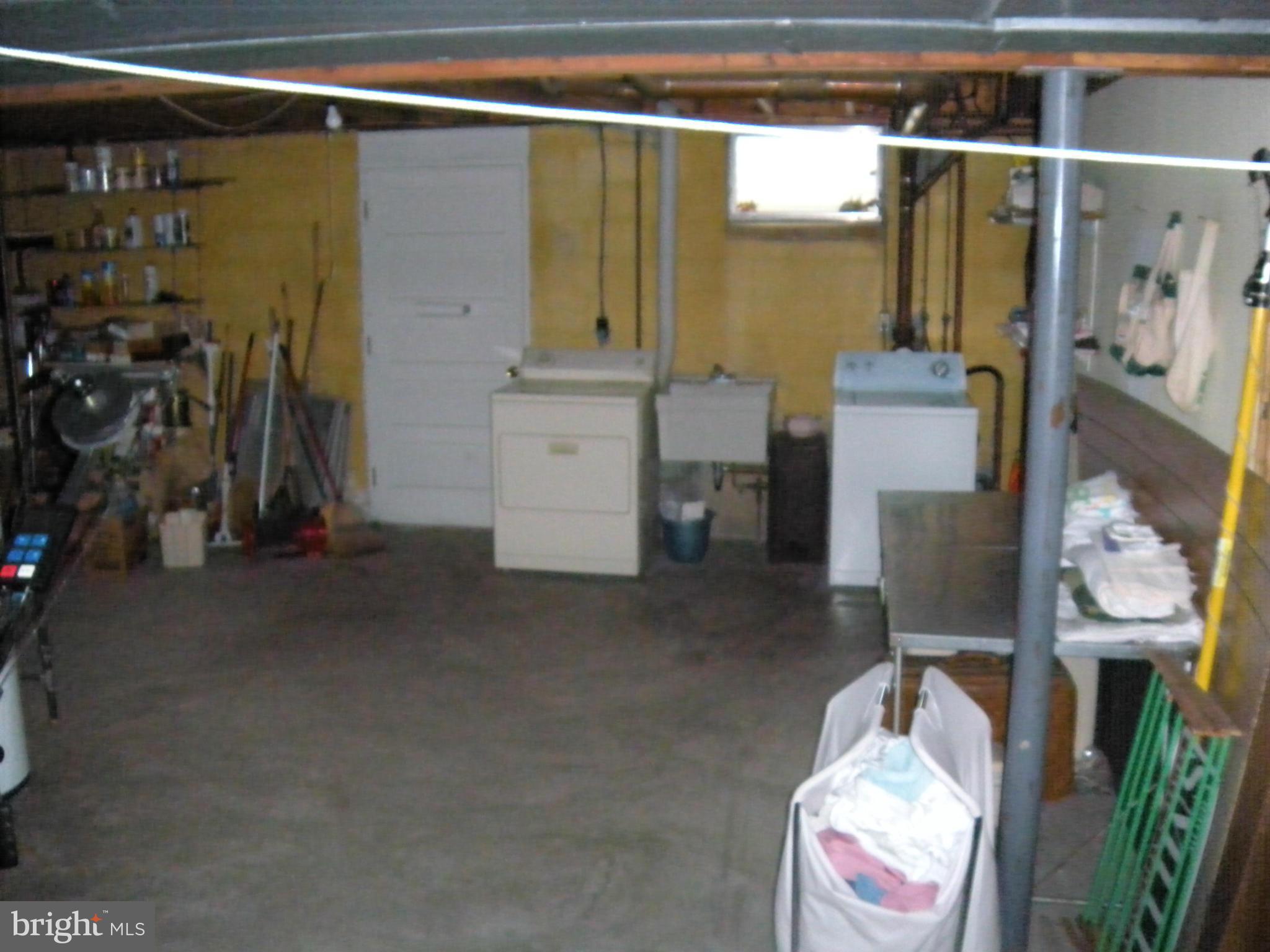 1307 Taney Avenue Frederick, MD 21702 - Photo 21 of 23 a bathroom with a sink a toilet and shower