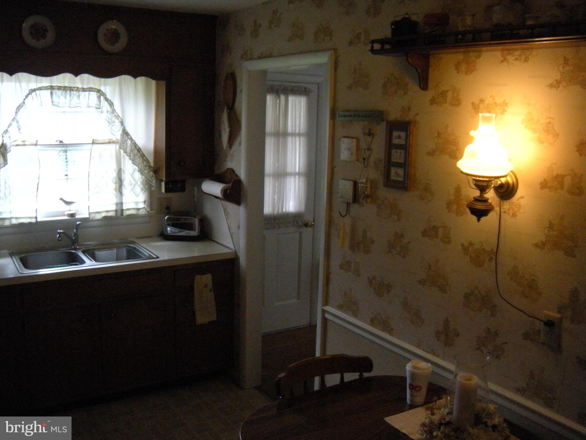 1307 Taney Avenue Frederick, MD 21702 - Photo 6 of 23 a bathroom with a sink and a shower