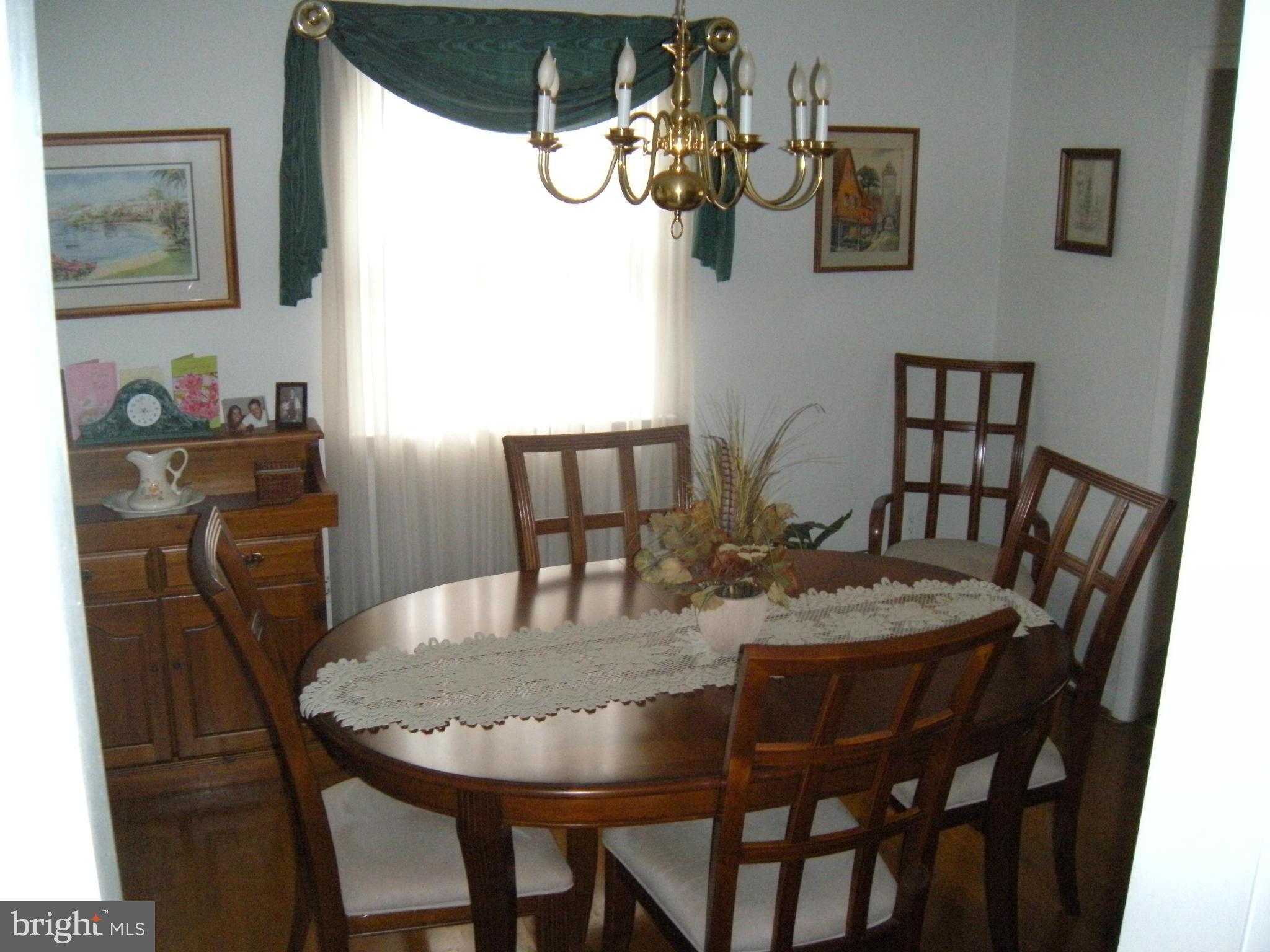 1307 Taney Avenue Frederick, MD 21702 - Photo 8 of 23 a view of a dining room with furniture