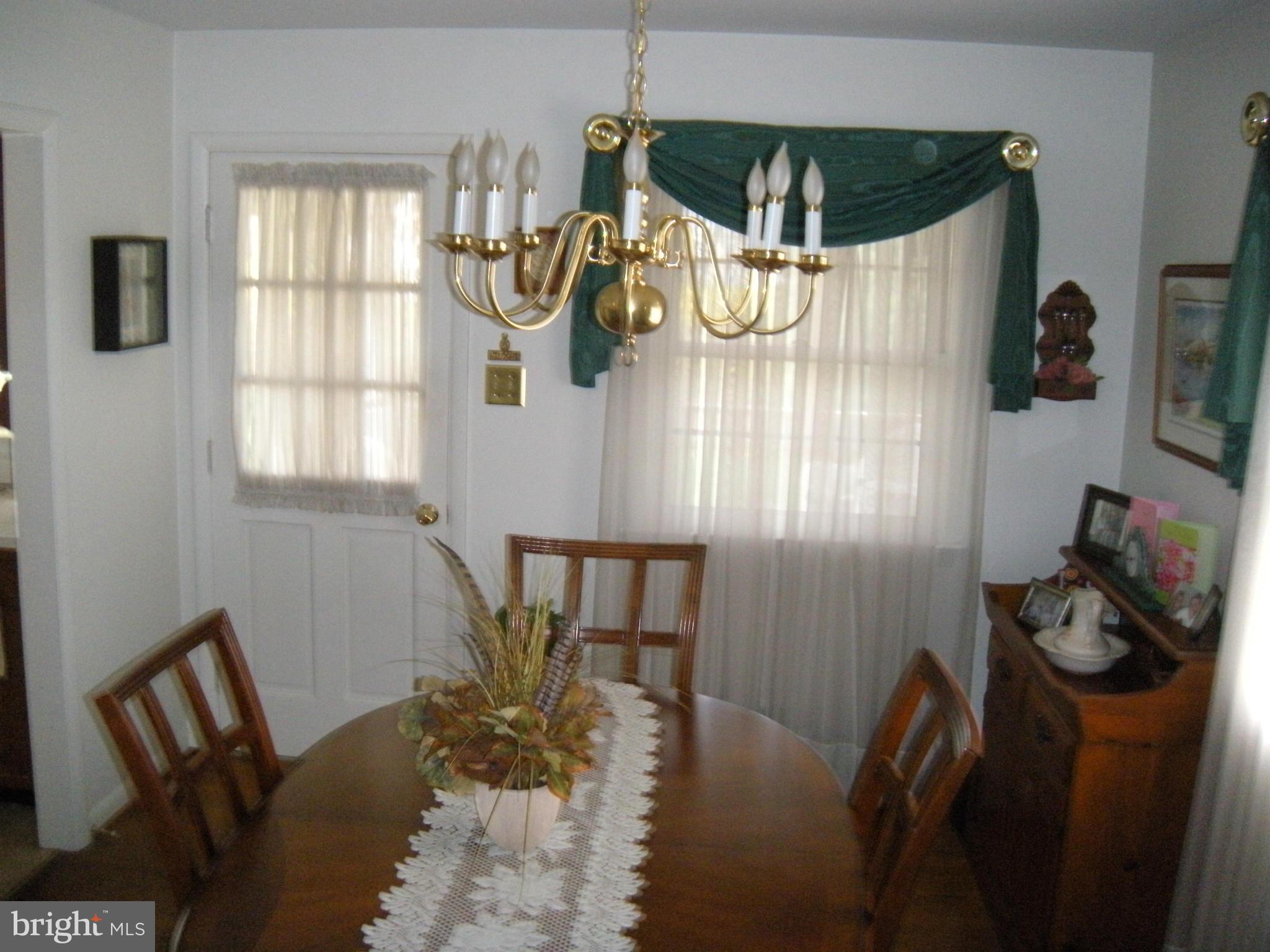 1307 Taney Avenue Frederick, MD 21702 - Photo 9 of 23 a view of walk in closet with clothes and shoes