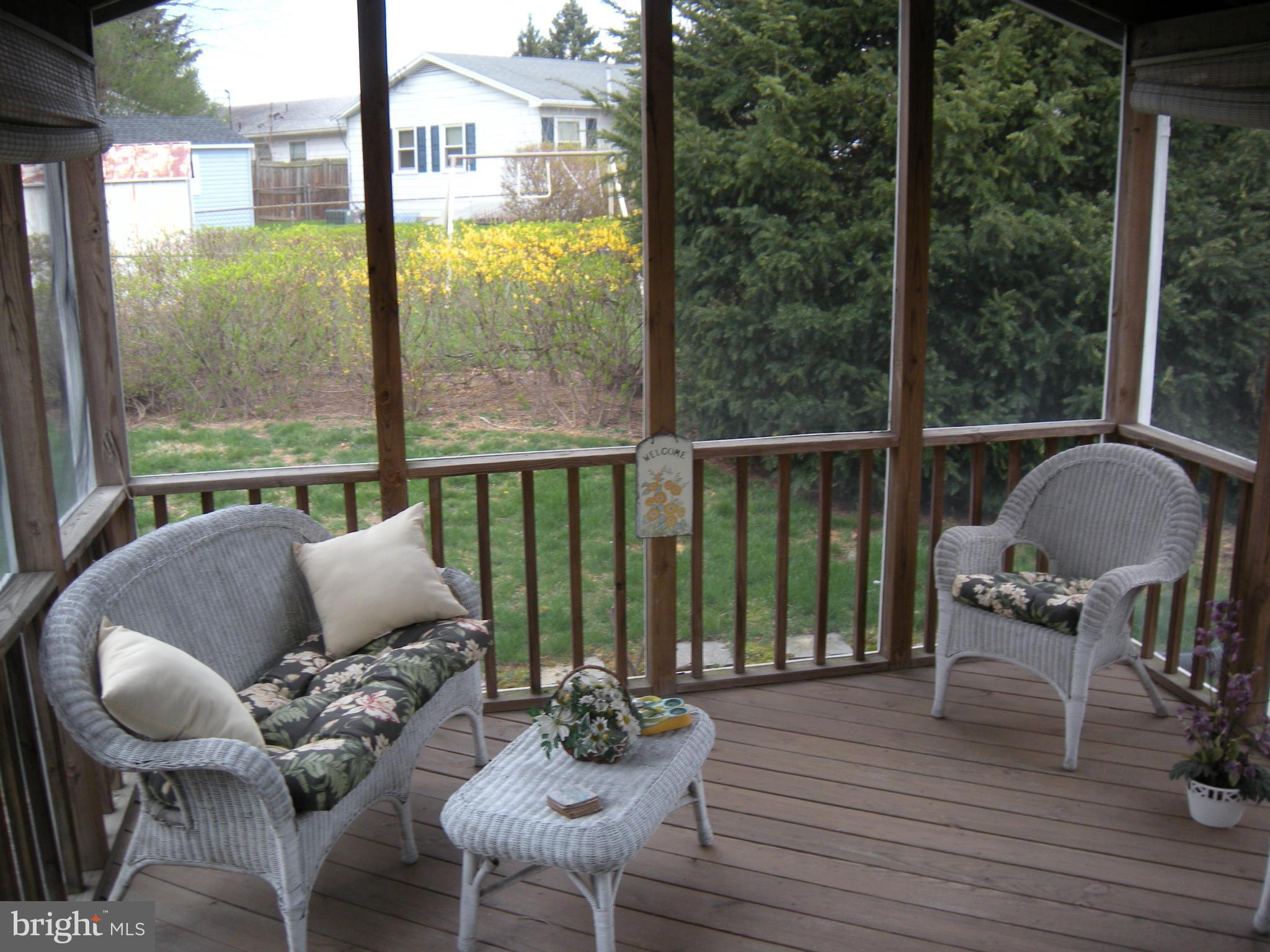 1307 Taney Avenue Frederick, MD 21702 - Photo 10 of 23 a living room with furniture and a floor to ceiling window