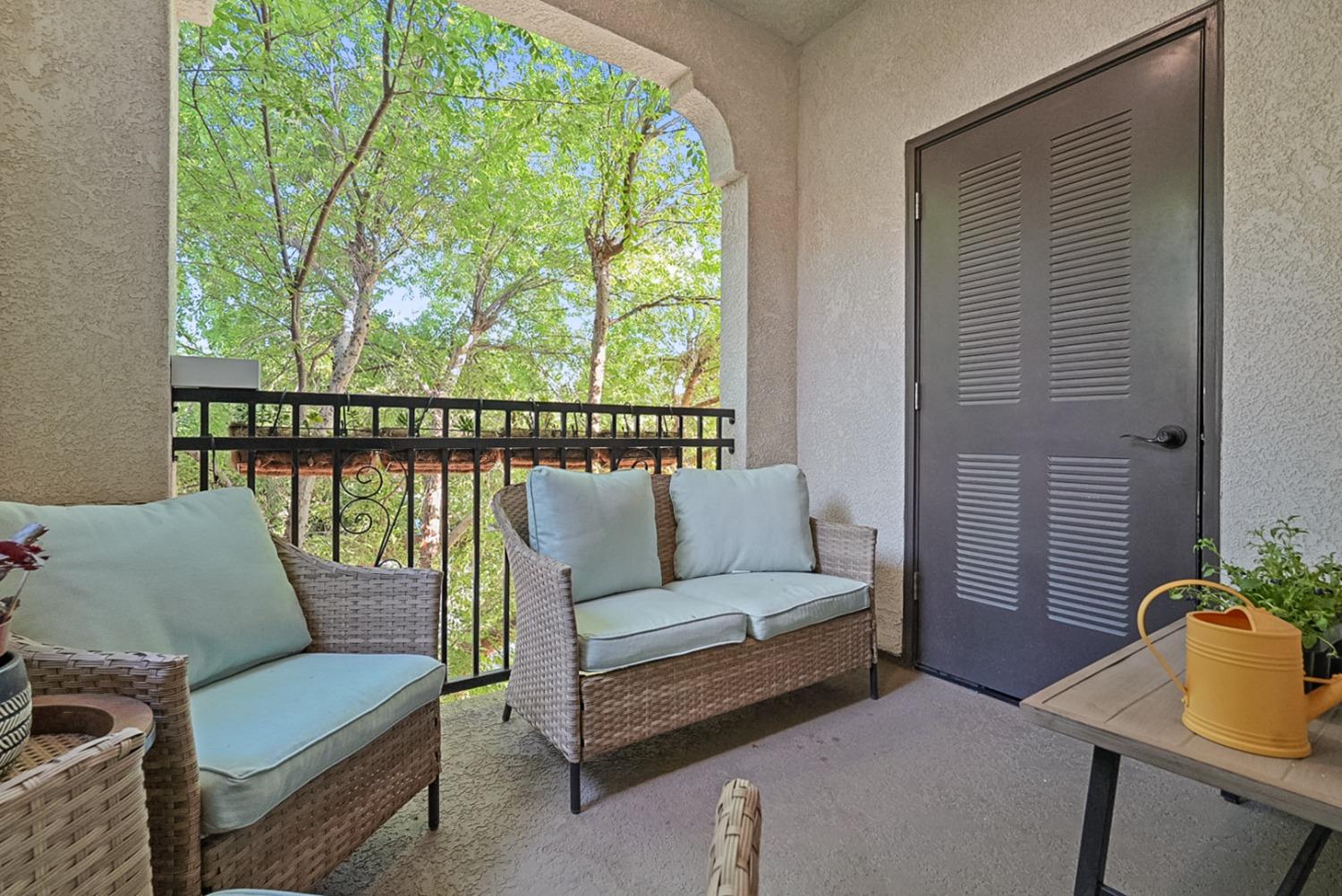 140 Ivy Avenue, Unit A5 Patterson, CA 95363 - Photo 18 of 26 a living room with furniture and a large window