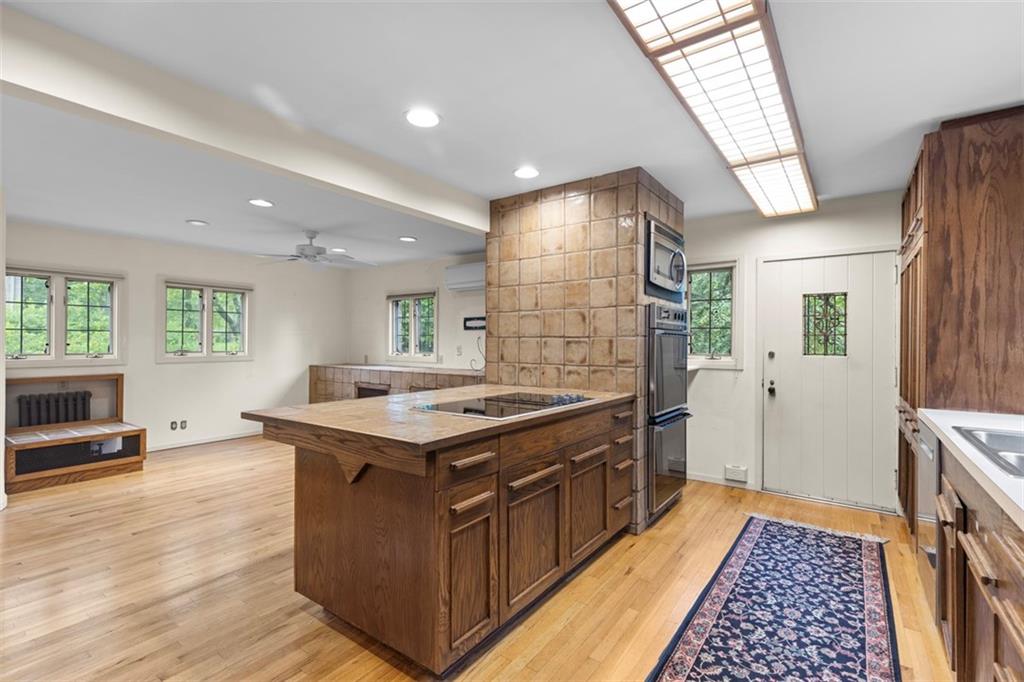 1 Robin Road Pittsburgh, PA 15217 - Photo 17 of 48 a kitchen with a stove and a refrigerator